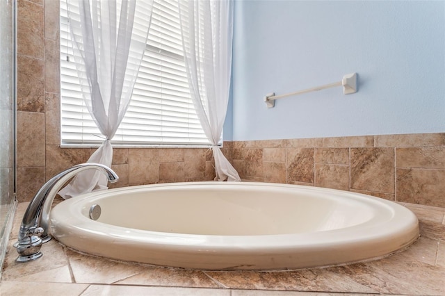 bathroom featuring a garden tub