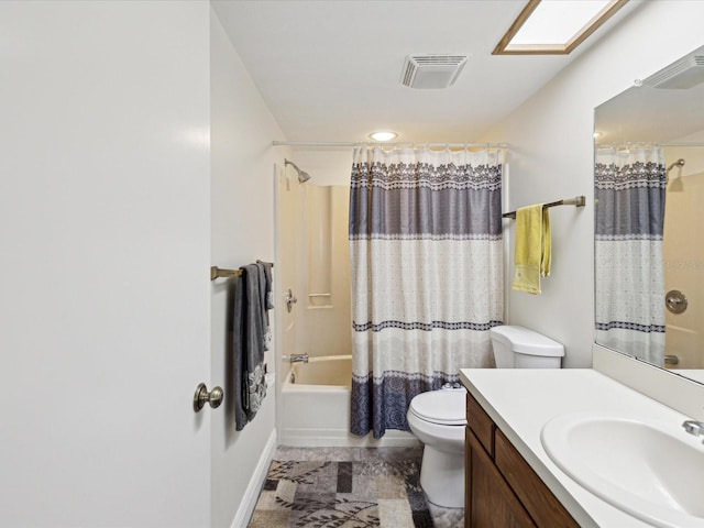 bathroom with a skylight, visible vents, toilet, shower / tub combo, and vanity