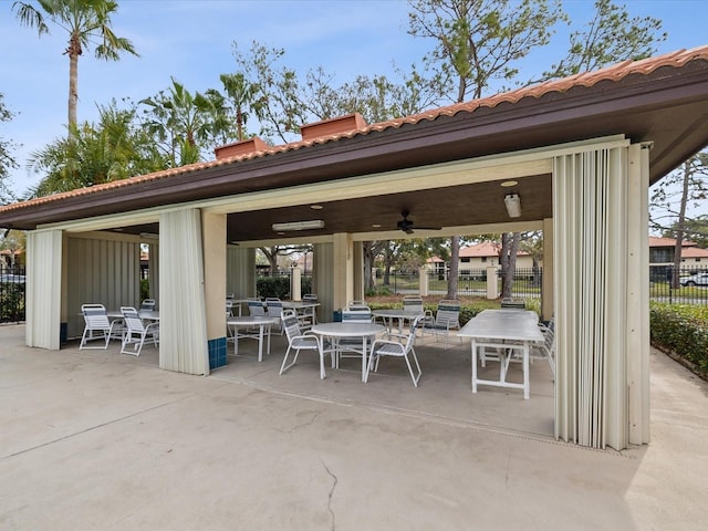 view of patio with a gazebo and fence