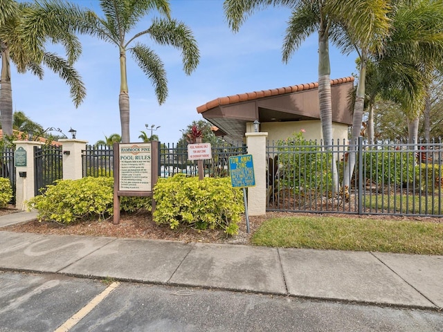 exterior space with a gate and fence