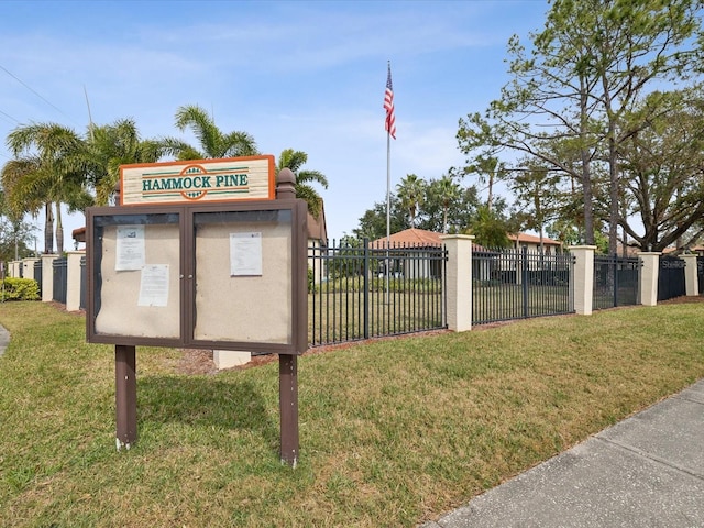 exterior space with fence and mail area