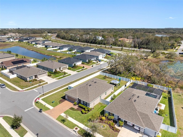 aerial view featuring a residential view and a water view