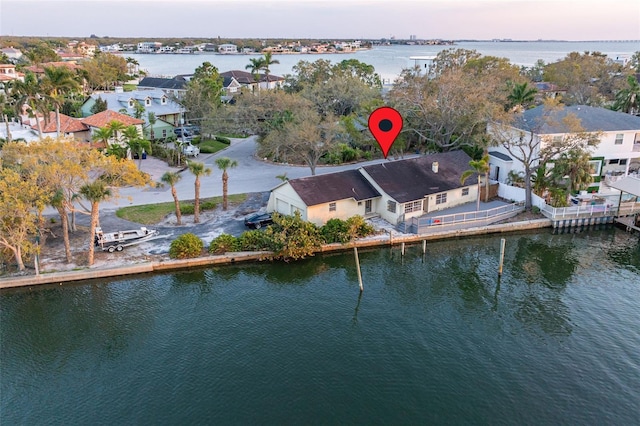 aerial view featuring a residential view and a water view