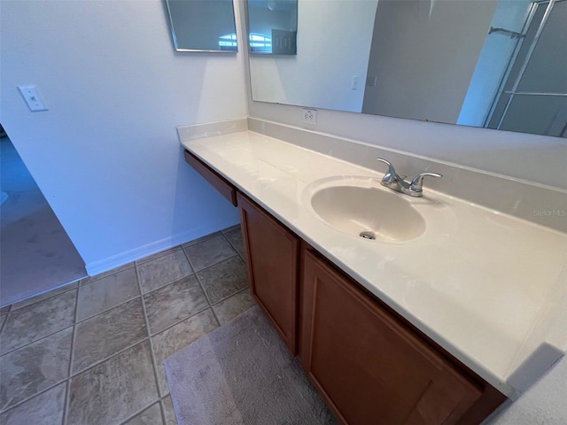 bathroom featuring vanity and tile patterned flooring