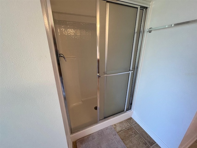 bathroom featuring a stall shower