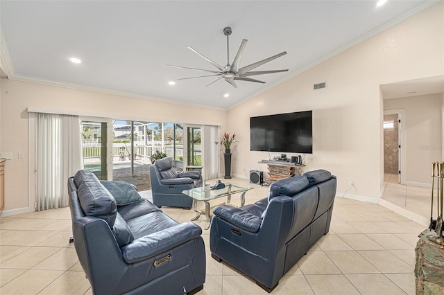 living room with a ceiling fan, crown molding, baseboards, and light tile patterned floors