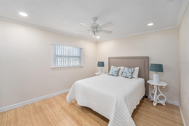 bedroom with crown molding, recessed lighting, ceiling fan, wood finished floors, and baseboards