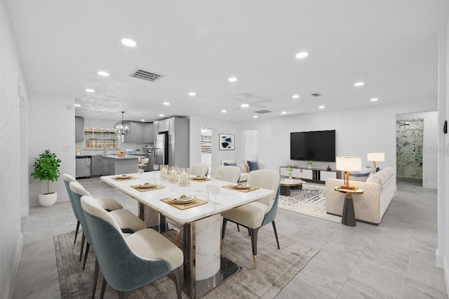 dining area featuring visible vents and recessed lighting