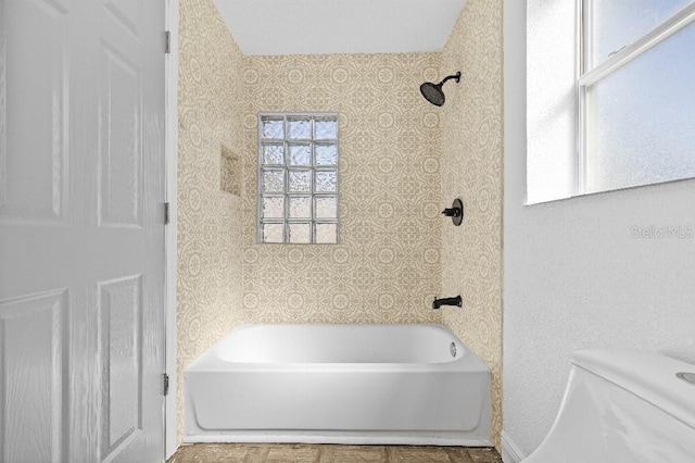 full bathroom with shower / bathing tub combination and toilet