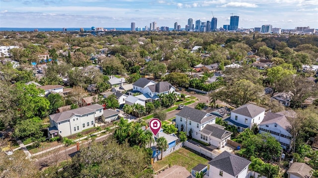 birds eye view of property featuring a view of city