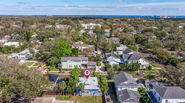 birds eye view of property with a residential view