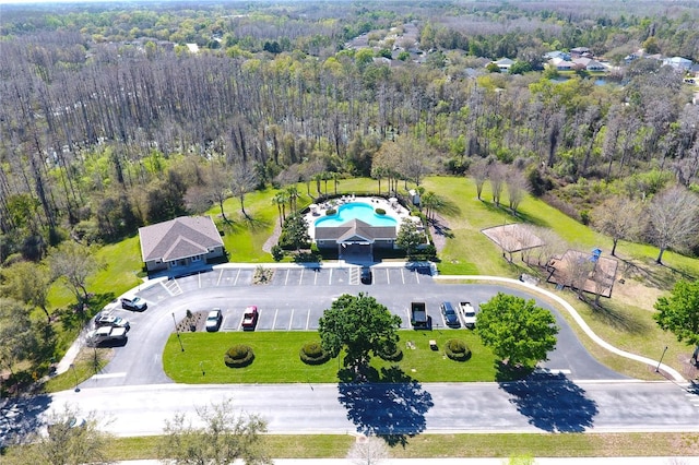 bird's eye view featuring a forest view