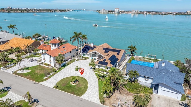 bird's eye view featuring a residential view and a water view