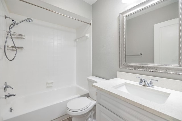 full bath with tub / shower combination, toilet, and vanity