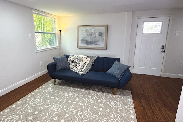 sitting room featuring wood finished floors and baseboards