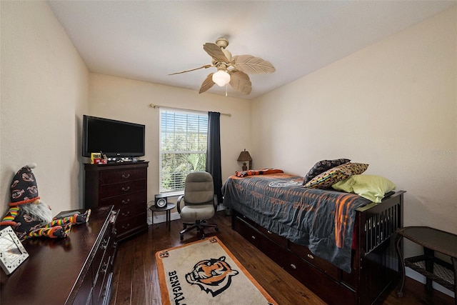 bedroom featuring ceiling fan and wood finished floors