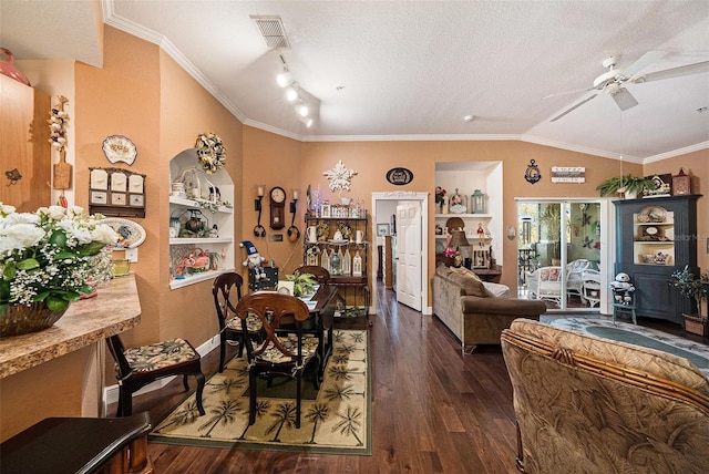 10017 Courtney Palms Blvd Unit 301, Tampa, FL 33619 - dining area featuring hardwood / wood-style flooring, a ceiling fan, lofted ceiling, a textured ceiling, and ornamental molding