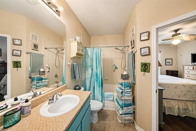 10017 Courtney Palms Blvd Unit 301, Tampa, FL 33619 - full bath featuring connected bathroom, shower / bath combination with curtain, vanity, ceiling fan, and a textured ceiling