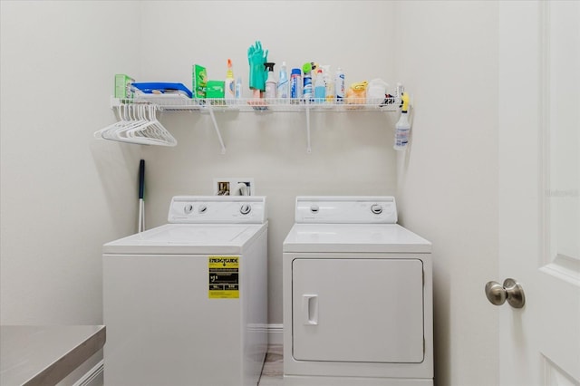 washroom featuring washer and dryer and laundry area