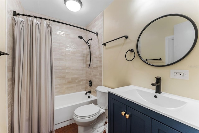 bathroom with toilet, shower / bathtub combination with curtain, wood finished floors, and vanity