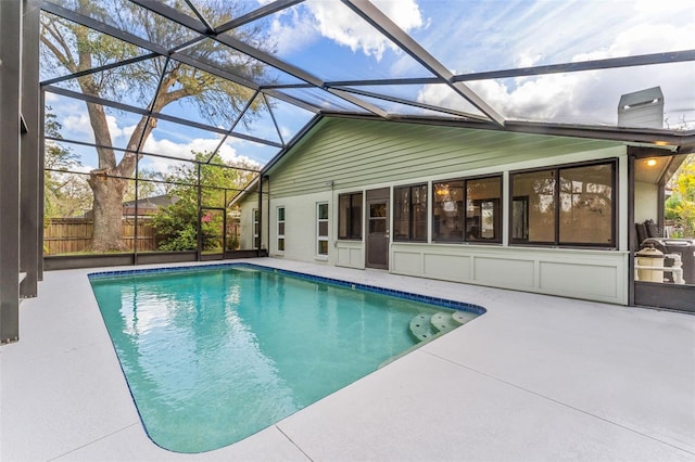 view of pool featuring a fenced in pool, a lanai, and a patio