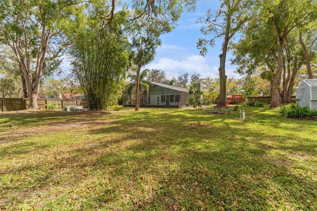 view of yard with a fenced backyard