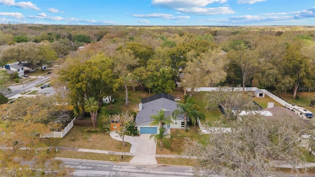 aerial view featuring a view of trees