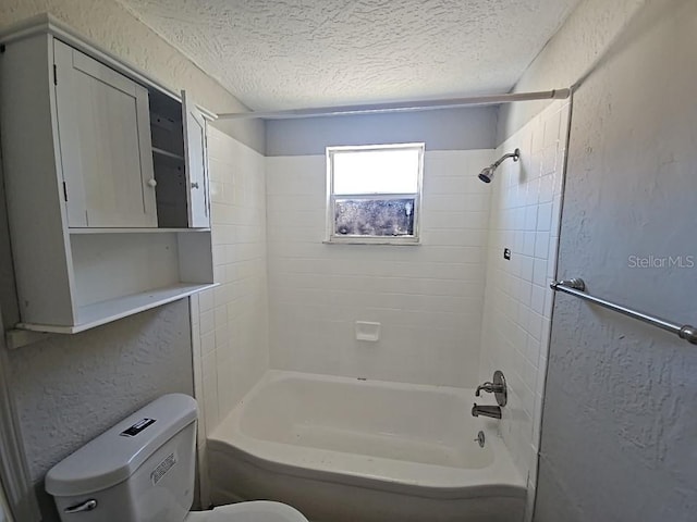 full bathroom featuring  shower combination, a textured wall, a textured ceiling, and toilet