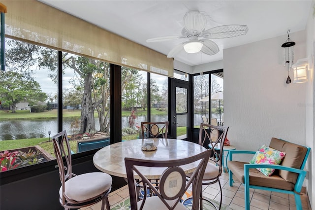11430 94th St, Largo, FL 33773 - sunroom with a water view, a textured wall, and tile patterned floors