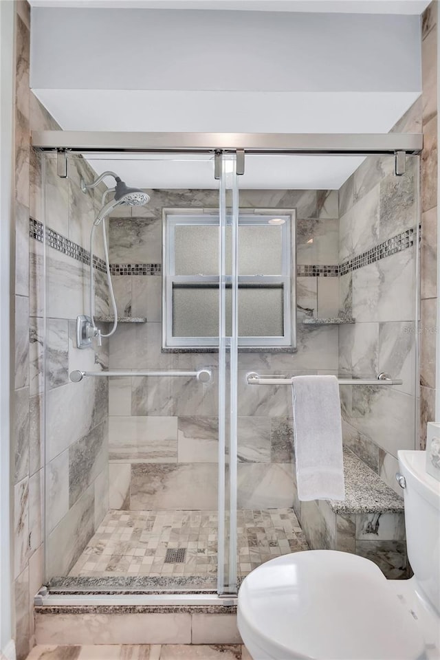 11430 94th St, Largo, FL 33773 - bathroom featuring toilet and a stall shower