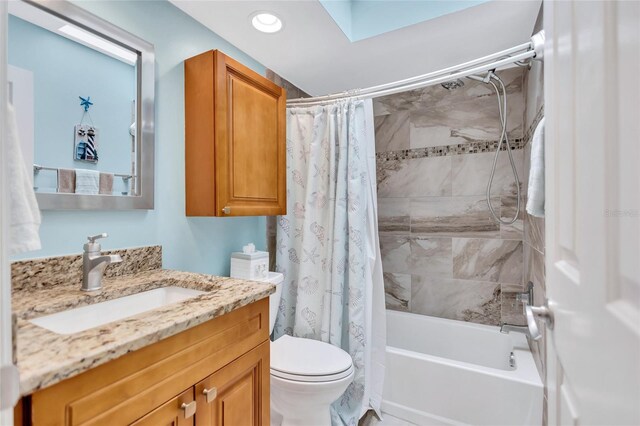 11430 94th St, Largo, FL 33773 - bathroom featuring a skylight, toilet, recessed lighting, vanity, and shower / bathtub combination with curtain