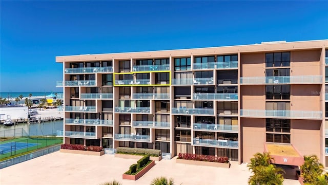 view of building exterior featuring a water view