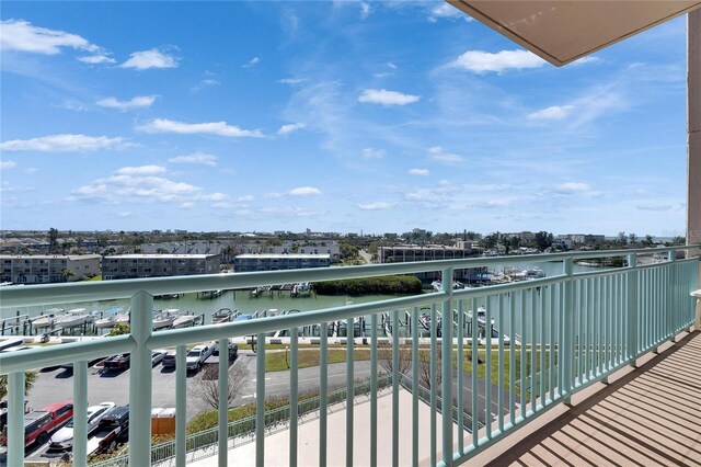 balcony featuring a water view