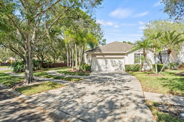 ranch-style home with a shingled roof, stucco siding, concrete driveway, a front lawn, and a garage