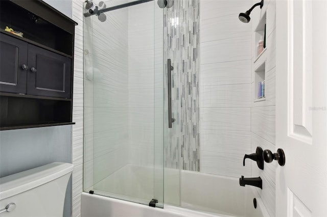 full bathroom featuring enclosed tub / shower combo and toilet