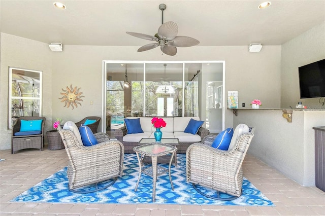 view of patio / terrace featuring an outdoor hangout area and a ceiling fan