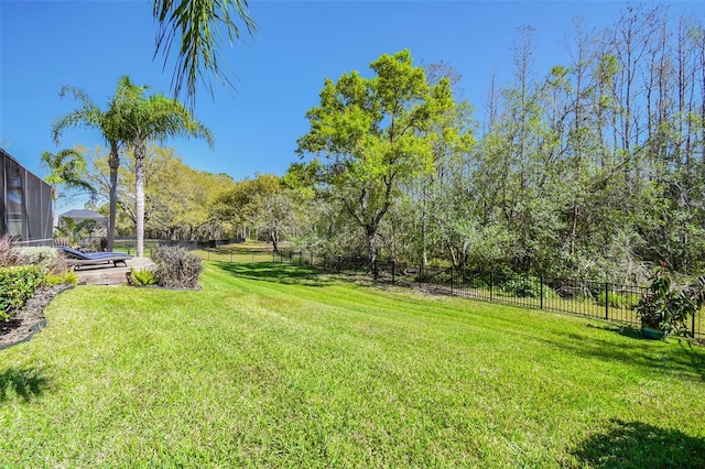 view of yard featuring fence