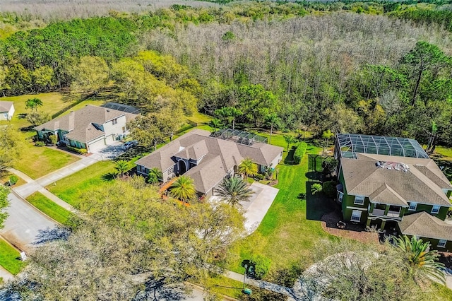 bird's eye view with a residential view and a forest view