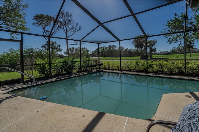 pool with a lanai and a patio