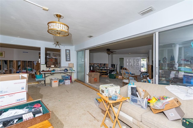 interior space featuring visible vents and a ceiling fan