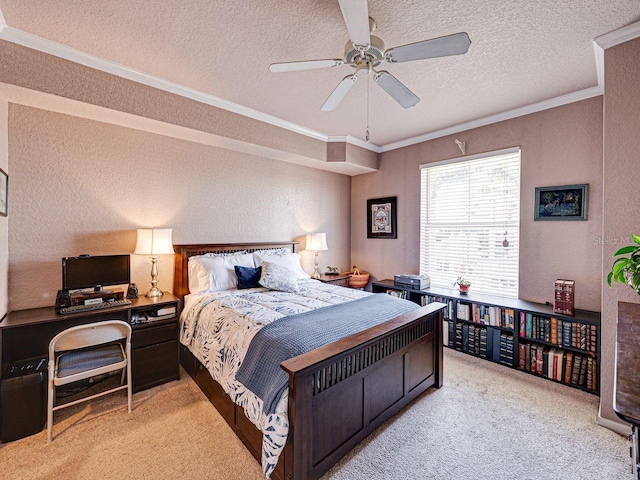 bedroom featuring carpet flooring, a textured ceiling, crown molding, ceiling fan, and a textured wall