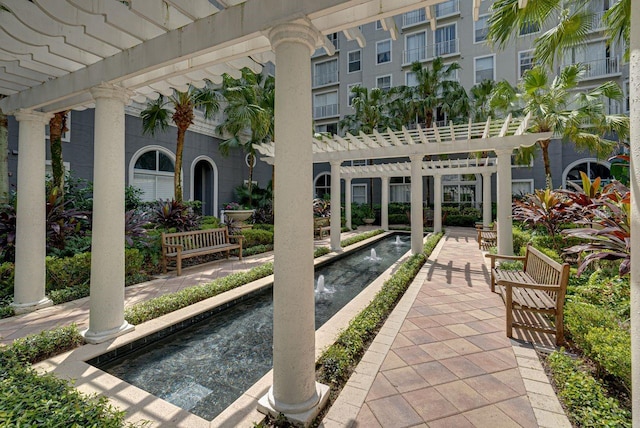 view of home's community with a pergola