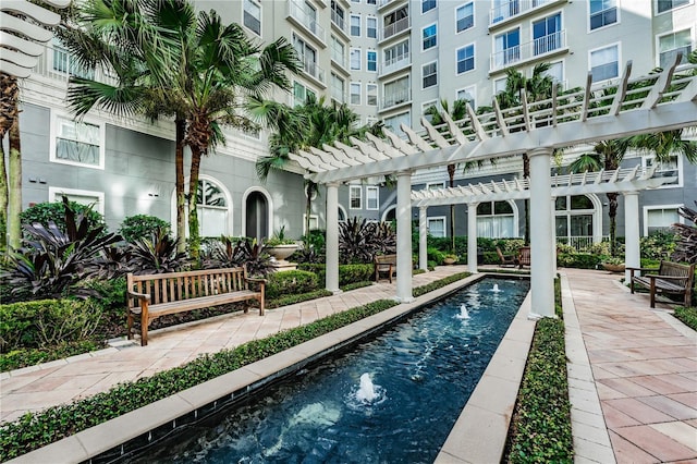 view of pool with a pergola