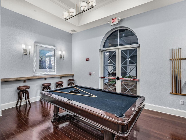 rec room featuring pool table, french doors, wood finished floors, baseboards, and a textured wall