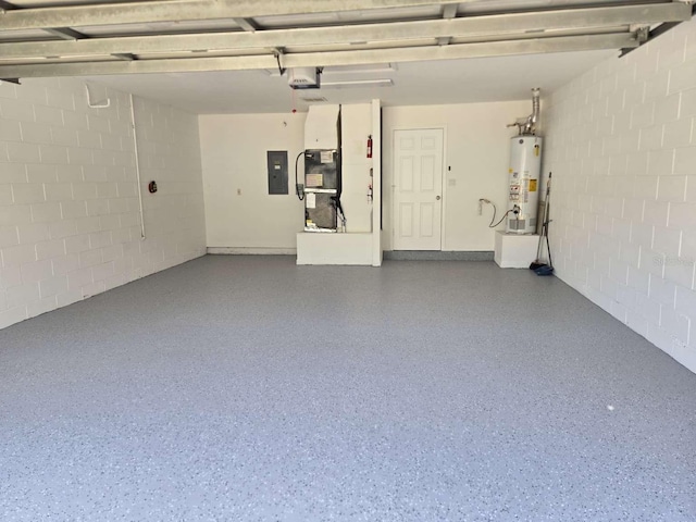 garage with gas water heater, concrete block wall, electric panel, and a garage door opener