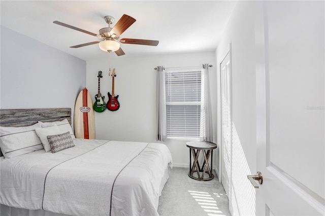 bedroom featuring carpet and ceiling fan