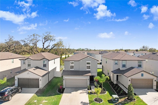 birds eye view of property with a residential view