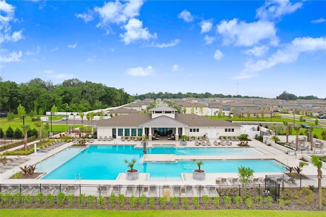 community pool featuring a gazebo, a patio, and fence