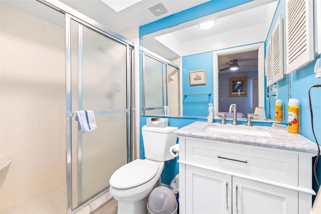 full bathroom with visible vents, toilet, ceiling fan, vanity, and a shower stall