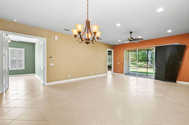 spare room featuring recessed lighting, ceiling fan with notable chandelier, and baseboards